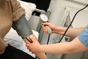 someone's vitals being checked